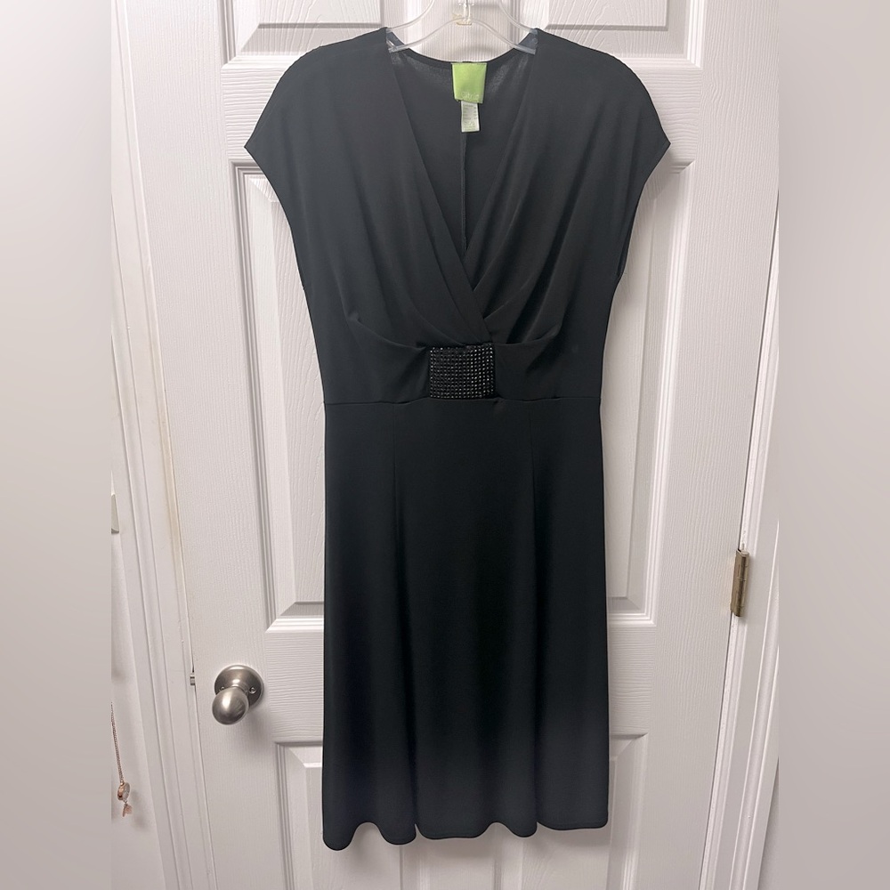 Vintage size 10 A-line black cocktail dress with rhinestone detail